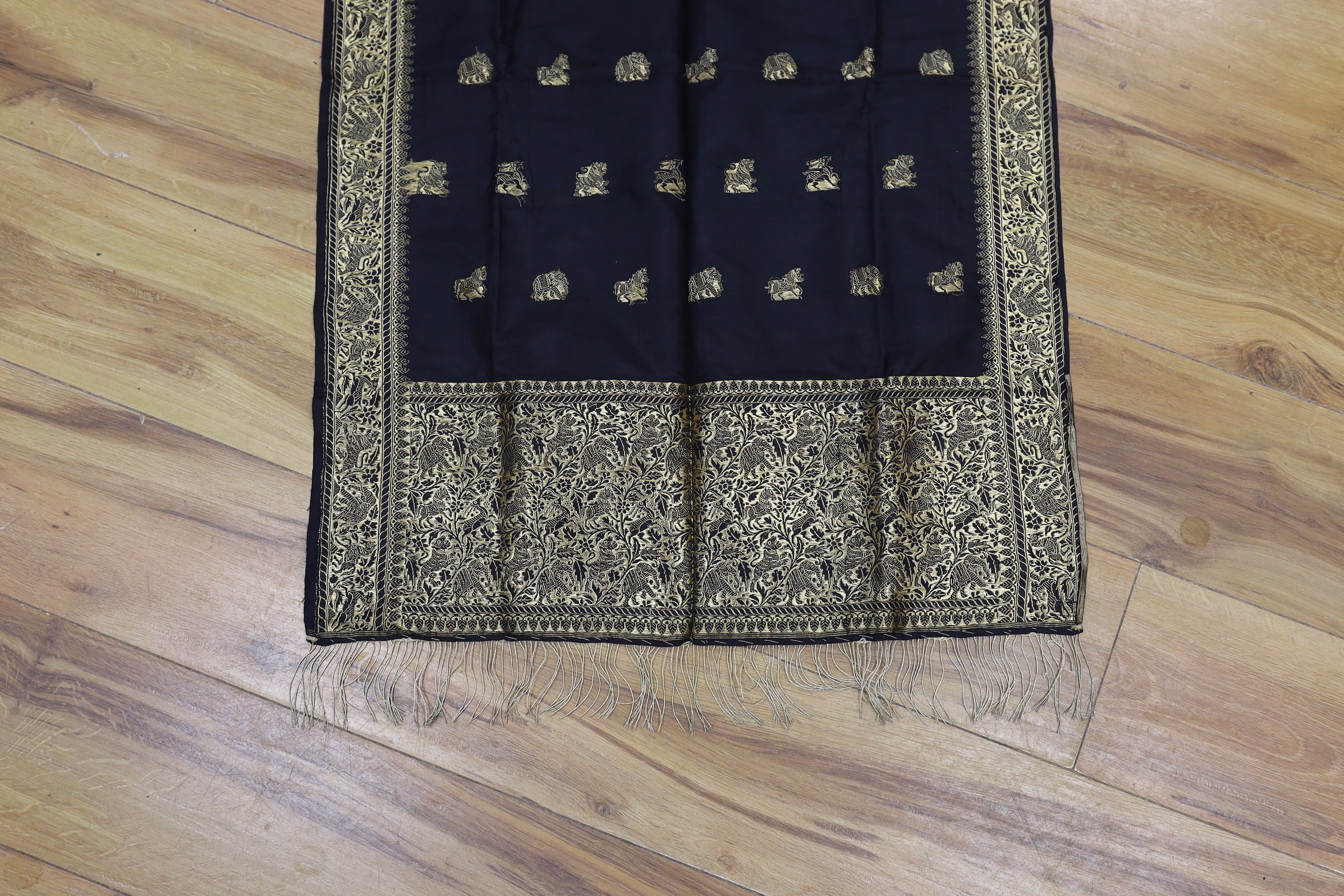 A gold thread Indian embroidered stole, 184 x 57cm